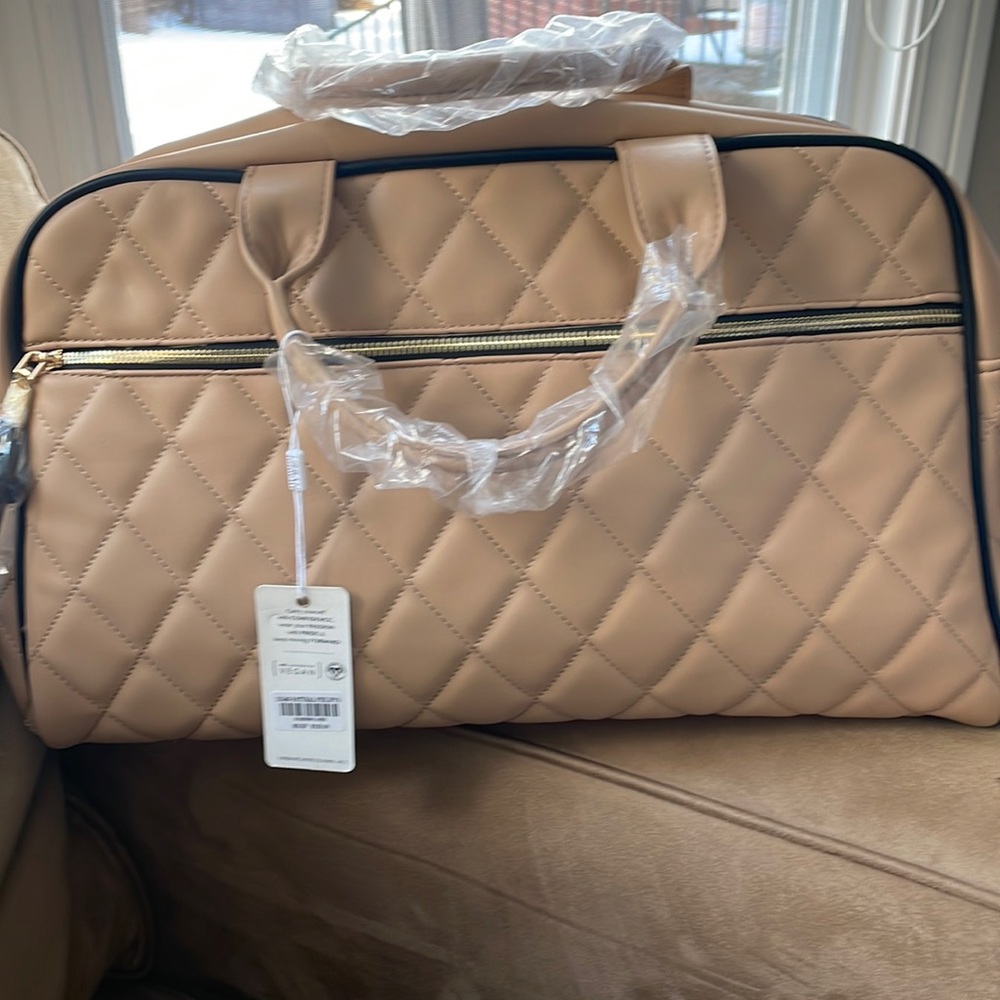 Light tan purse/travel bag